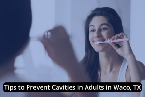 A woman brushes her teeth in front of a mirror. Text overlay reads, "Tips to Prevent Cavities for Adults in Waco, TX.